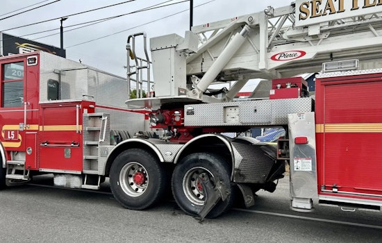 Fatal Early Morning Collision with Fire Truck in Seattle Claims Life of Driver; Passenger in Serious Condition