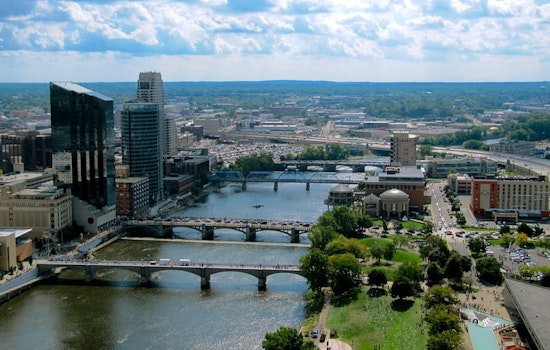 Grand Rapids Firefighters Conduct Unconventional Rescue of Drifting Porta-Potties on Grand River