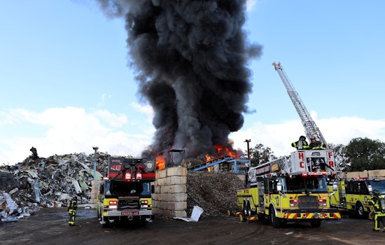 Hillsborough Firefighters Battle Intense 3-Alarm Scrapyard Blaze in Tampa Amid Lightning Threats
