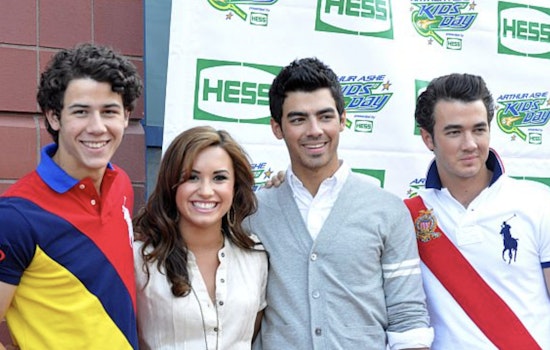Jonas Brothers and Demi Lovato Surprise Fans with "Camp Rock" Reunion at New Jersey's MetLife Stadium