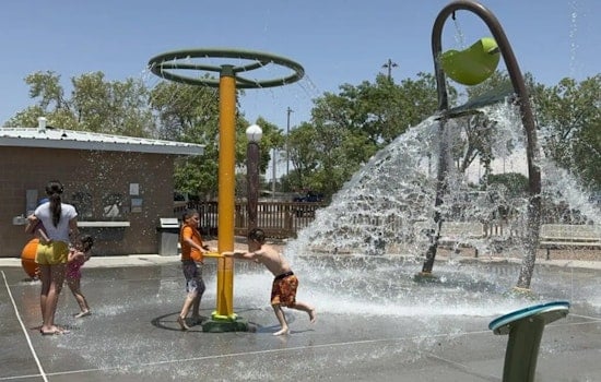 Las Cruces Police and Raising Cane's Host Community Lunchbox Lemonade at Unidad Park Splash Pad