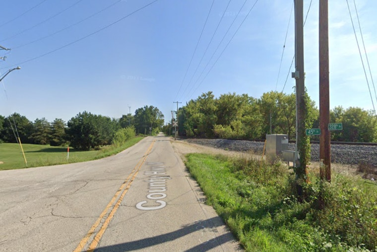 One Dead After Pickup Truck and Train Collide in Kenosha County as Environmental Concerns Arise from Damaged Container