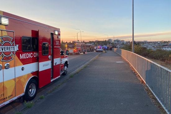 One Dead, Two Injured as Vehicle Rollover Sparks Brush Fire in Everett