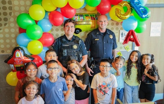 Tulsa Police Engage with Kids at "Coloring with a Cop" Event at Local McDonald's