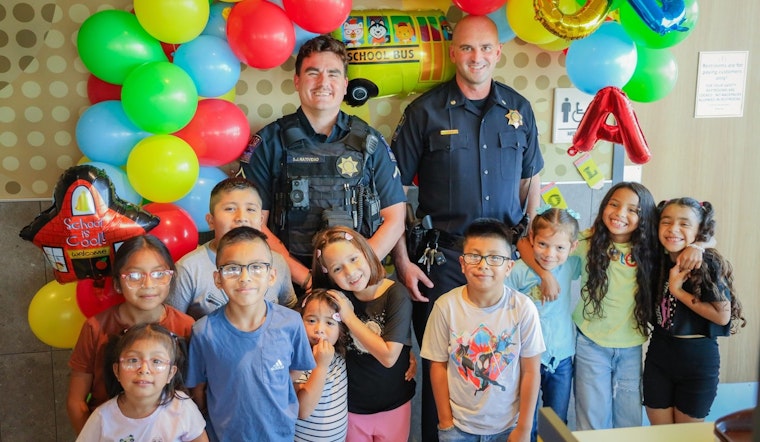 Tulsa Police Engage with Kids at "Coloring with a Cop" Event at Local McDonald's