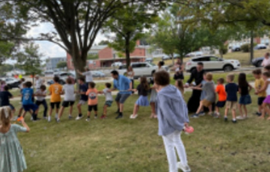 Boston Police Join Holy Name Parish BBQ, Strengthening Community Bonds in West Roxbury