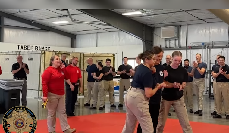 VIDEO: Douglas County Sheriff's Office Spokesperson Voluntarily Undergoes Taser Training with Cadets
