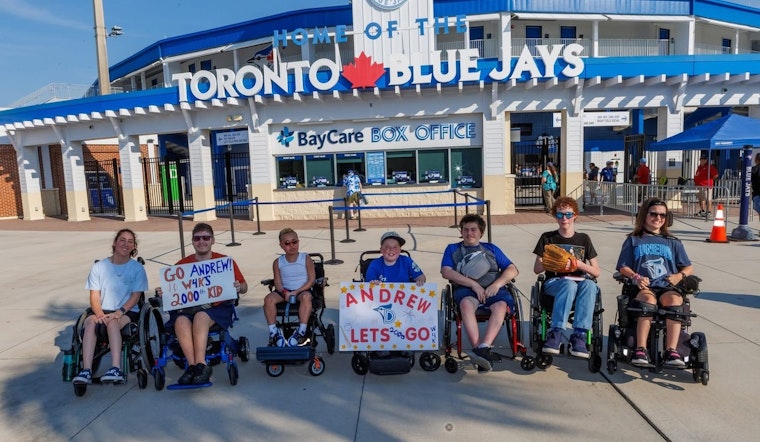Dunedin Blue Jays Celebrate Wheelchairs4Kids' Milestone with First Pitch by Recipient of 2000th Wheelchair