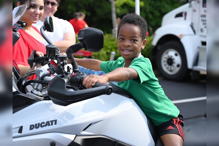 Milton's Annual Touch-a-Truck Event Draws Crowds Despite Weather Concerns