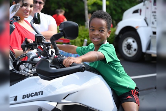 Milton's Annual Touch-a-Truck Event Draws Crowds Despite Weather Concerns