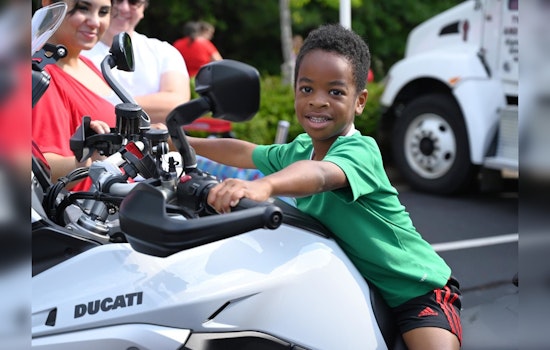 Milton's Annual Touch-a-Truck Event Draws Crowds Despite Weather Concerns