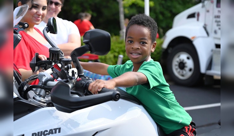 Milton's Annual Touch-a-Truck Event Draws Crowds Despite Weather Concerns