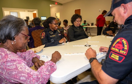 Raleigh Police and Firefighters Swap Badges for Cards in Community Engagement Effort