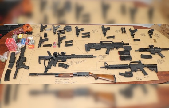 Riviera Beach Man Apprehended After Crashing Car and Brandishing Gun, 14 Firearms Seized