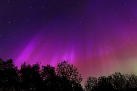 Spectacular Celestial Showdown: 'Cannibal' Solar Storm Set to Unleash Northern Lights Over US Skies