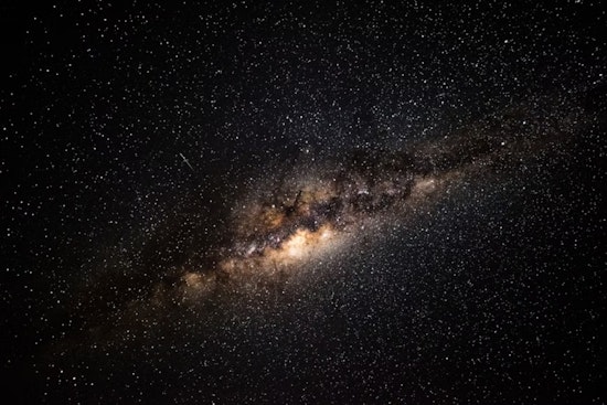 University of Cincinnati Physicist Explores the Dark Side of the Cosmos: Dark Matter and Energy Unveiled