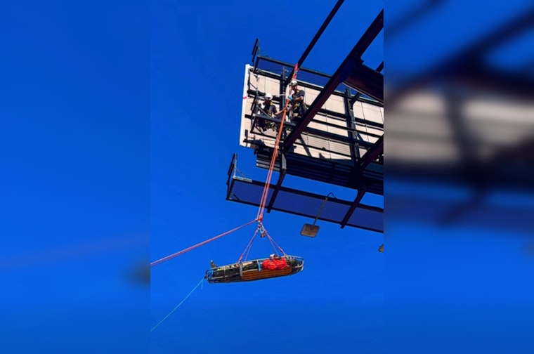 Oklahoma City Firefighters Execute Skilled Rescue of Worker atop Billboard