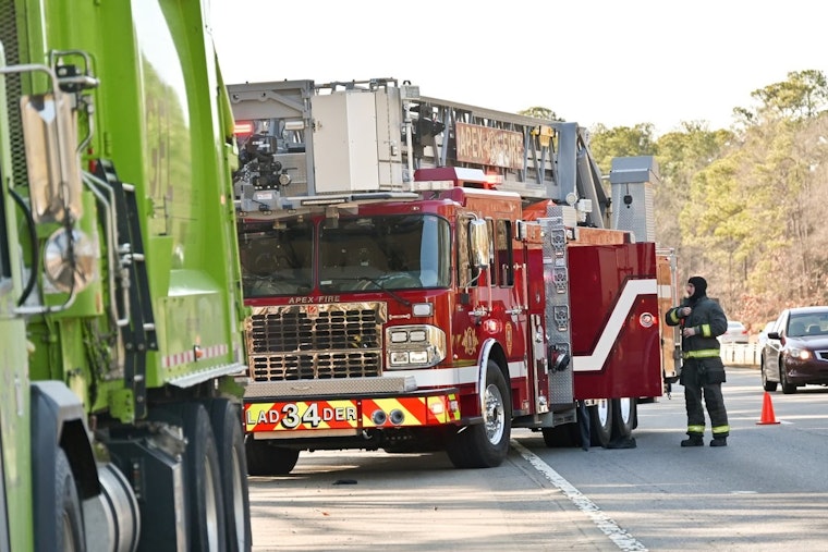 Apex Firefighters Quickly Contain Smoking Garbage Truck Avoiding Potential Disaster
