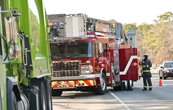 Apex Firefighters Quickly Contain Smoking Garbage Truck Avoiding Potential Disaster
