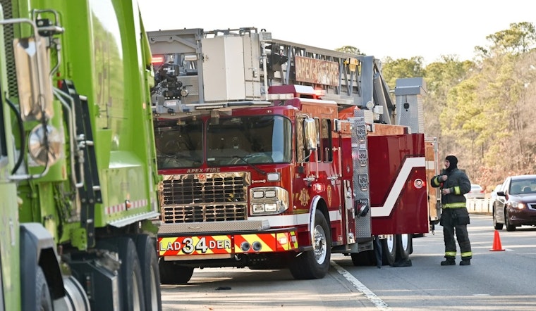Apex Firefighters Quickly Contain Smoking Garbage Truck Avoiding Potential Disaster