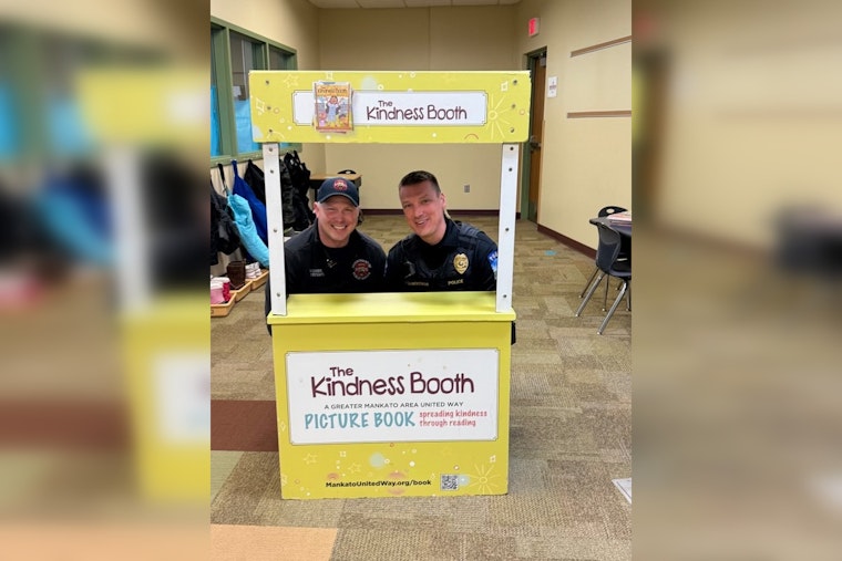Mankato's Bravest Trade Fire Hoses for Books in United Way Literacy Initiative