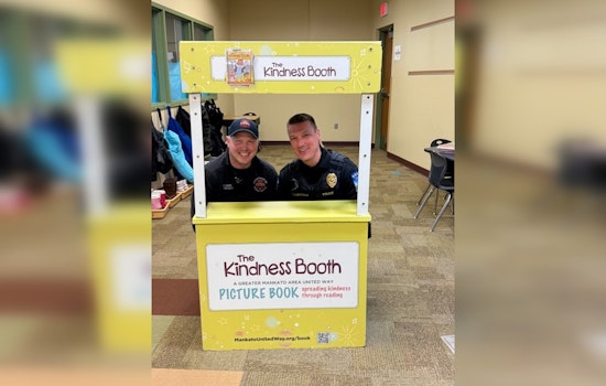 Mankato's Bravest Trade Fire Hoses for Books in United Way Literacy Initiative