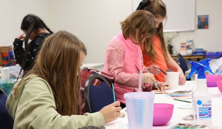 Marysville Art Studio Hosts Family-Friendly Neon Peace Sign Painting Event