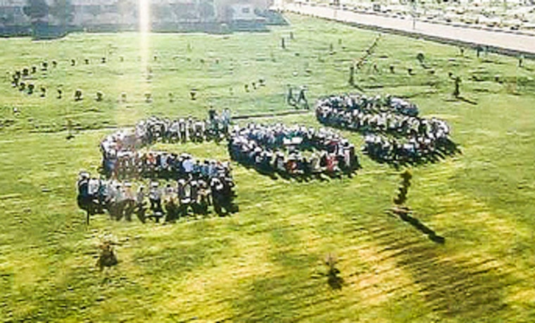 Minneapolis Protesters Form 'SOS' On Frozen Bde Maka Ska