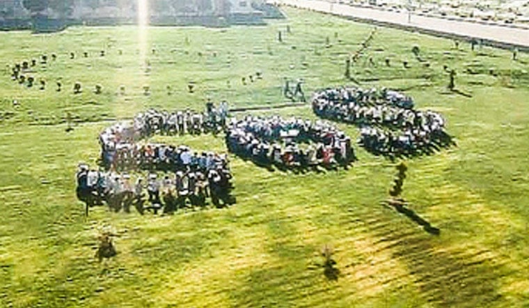 Minneapolis Protesters Form 'SOS' On Frozen Bde Maka Ska