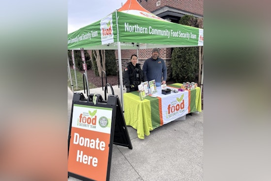 Wake Forest Police Join Forces with NCFST for Canned Food Drive at Local Texas Roadhouse