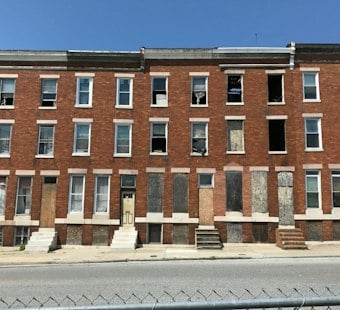 2,000 Pack Woodlawn Church to Grill Moore and Cox on Baltimore Vacants