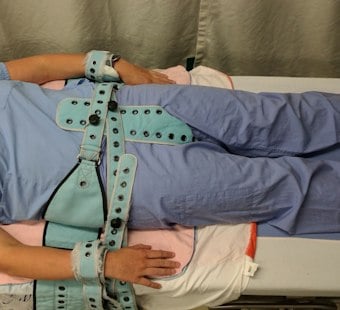 Atlanta Health Workers Rally Against Shackling Patients to Hospital Beds 24/7