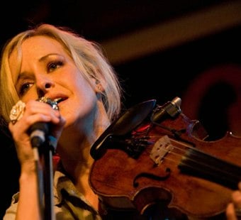 Austin Bars Pour Drinks For HOME, Helping Aging Musicians Keep Their Housing