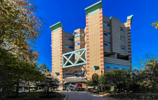 Batman and Spider-Man Rappel Down Providence Hospital, Delighting Young Patients