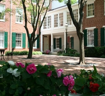 Black-Owned Oaks Hospitality Buys Jonestown's 1840s Carrollton Inn, Event Plaza