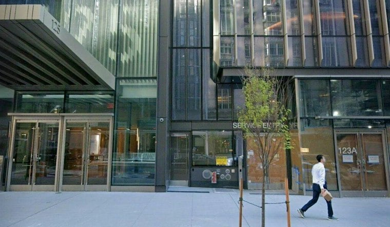 Car Flips Onto Its Side in Midtown, Three Hurt on West 57th Street