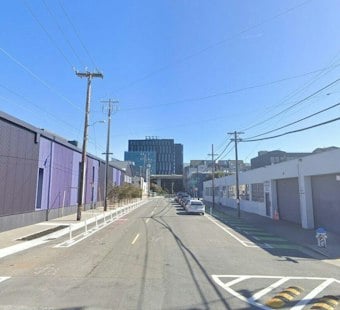 Car Slams Into Outer Mission Building, Forces Four or Five Residents Out