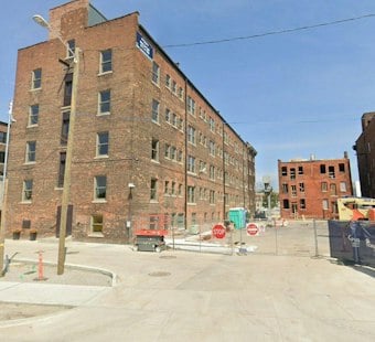 Cass Park's Century-Old Apartment Hotels Reopen as 170 Homes Near Little Caesars Arena