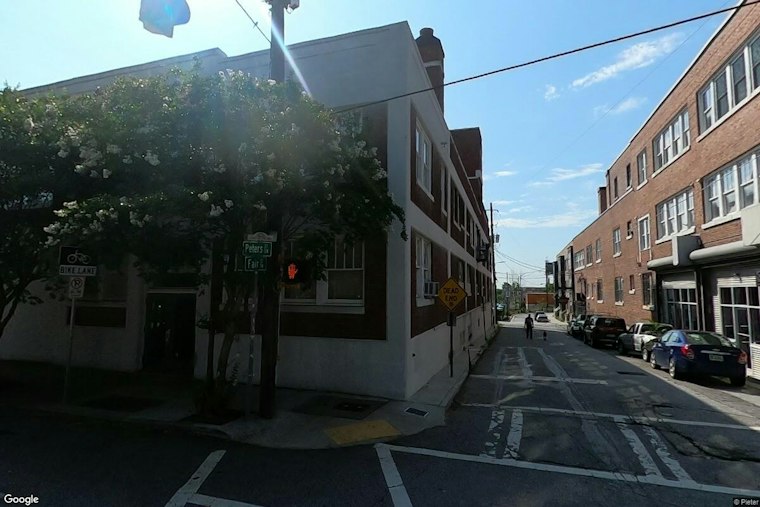 Castleberry Hill Wins Fight to Move Pedestrian Signals Off Historic Swift & Co. Lofts
