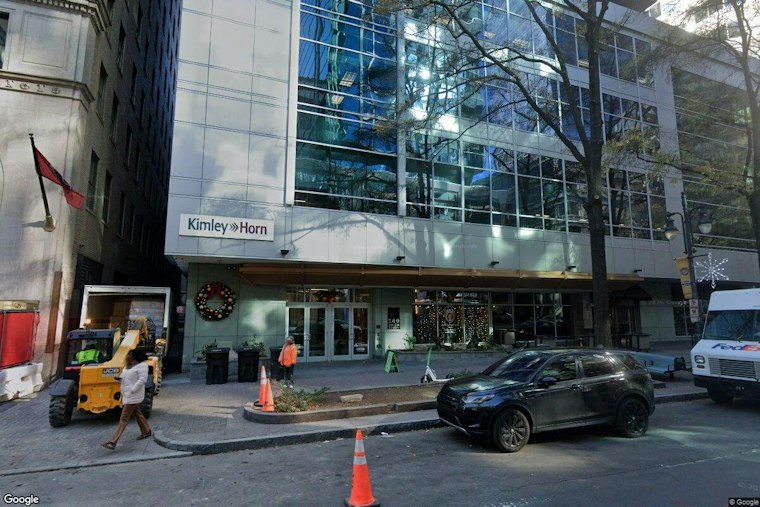 Charlotte Police Pull Over Couch 'Driving' Down South Tryon Street On Two Lime Scooters