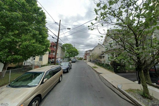 Chelsea Brick Wall Collapses on Orange Street, Residents Bused to Safety in Rain
