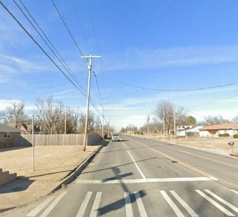 Del City School Bus Hit by Driver Who Fled Across Two Yards, Police Say