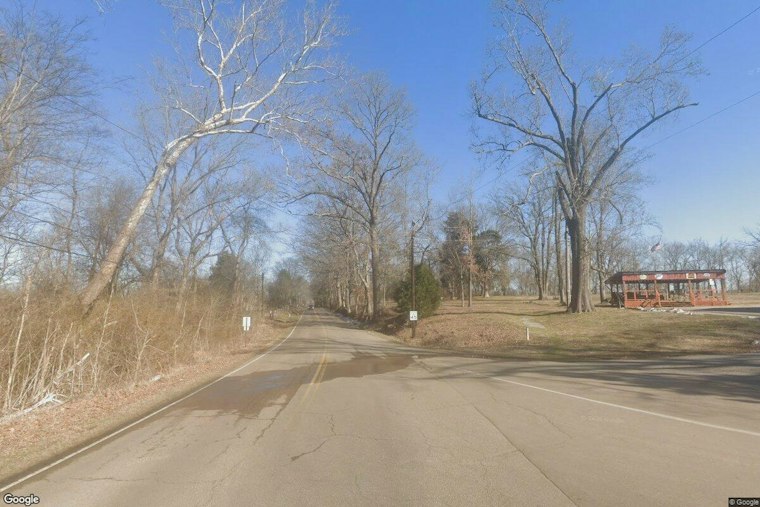 Driver Critical After Rollover Crash Into Tree Near Millington, Trapped in Wreckage
