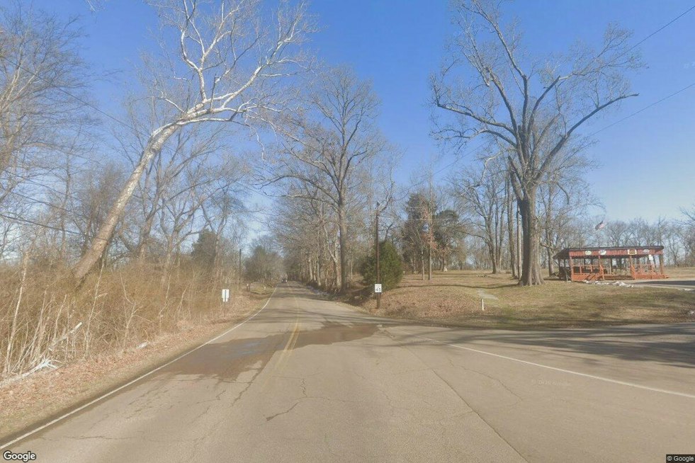 Driver Critical After Rollover Crash Into Tree Near Millington, Trapped in Wreckage