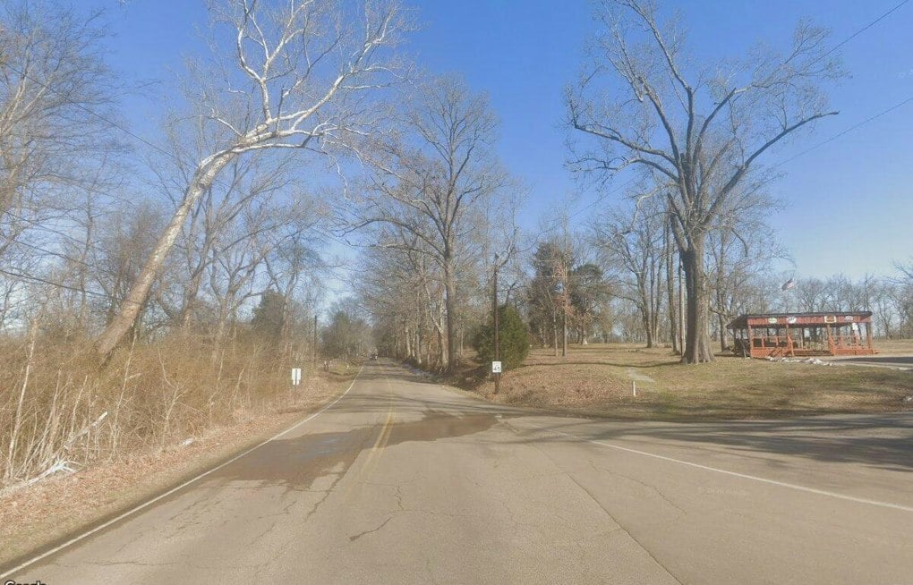 Driver Critical After Rollover Crash Into Tree Near Millington, Trapped in Wreckage