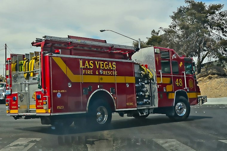 East Las Vegas Mobile Home Fire Hospitalizes Two, Threatens Neighbor's House