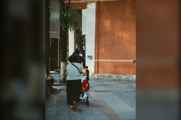 Flushing Grandmother Punched Pushing Stroller, NYPD Seeks Suspect