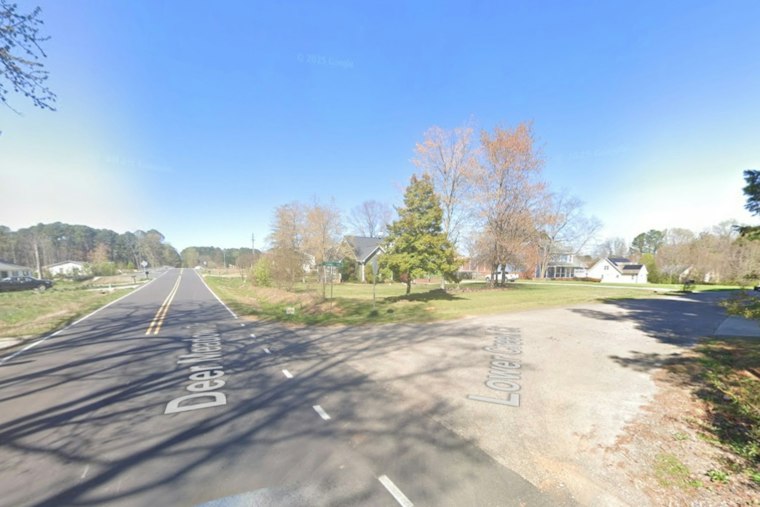 Garbage Truck Crash Near Apex Shuts Down Street; Person Covered by Tarp