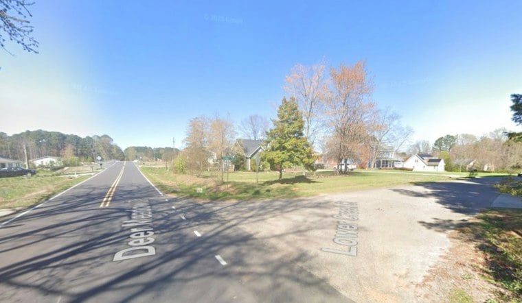 Garbage Truck Crash Near Apex Shuts Down Street; Person Covered by Tarp