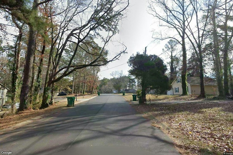 Gunfire Rips Through Timbers East Drive Homes in Lithonia, Wounding Two